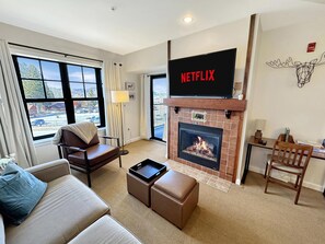 Enjoy the gas fireplace and HD TV with Roku