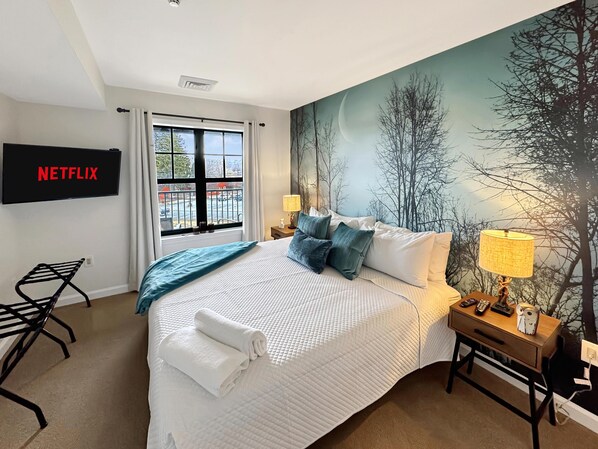 Welcome to "Night Forest". The bedroom has a new king bed with all new bedding with amazing mountain front views!