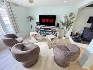 Nice entertainment area in the basement that includes a pool table and dart board