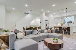 Open floor concept featuring the living room,  kitchen, and dining area