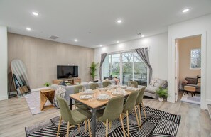 Dining area in an open floor plan concept with the living room
