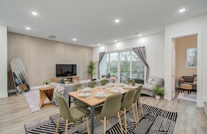 Dining area in an open floor plan concept with the living room
