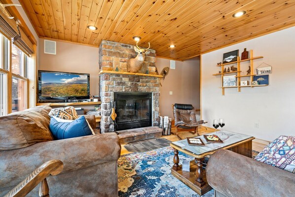 Settle in and enjoy the warmth of this inviting living room.