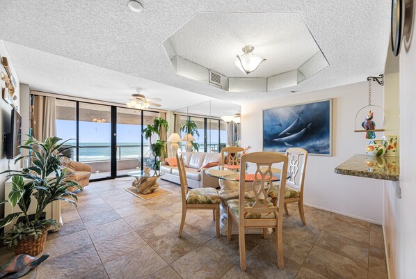 A spacious and inviting dining area with scenic views, perfect for gatherings.