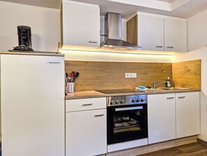 Kitchen Appliance, Countertop, Kitchen, Major Appliance, Cabinetry, Interior Design, Wood, Flooring, Home Appliance, Plumbing Fixture
