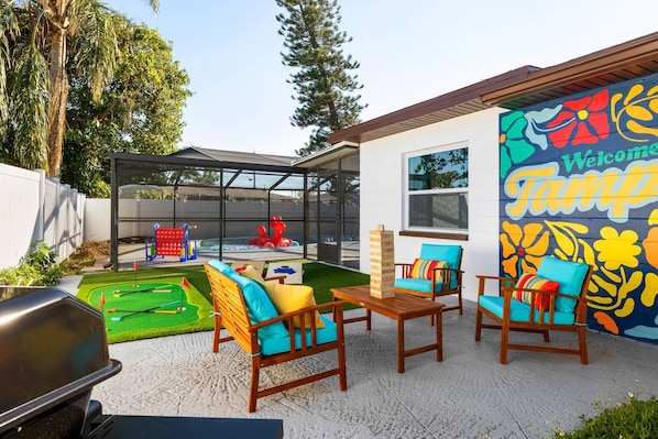 Inside or out, comfort reigns—chic interiors, plush sofas, and entertainment for everyone