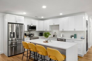 Cook like you never left home—modern kitchen, stainless appliances, and all the essentials