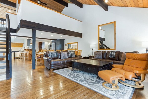 Spacious Living Room with Vaulted Ceilings, Gas Fireplace, Smart TV and Comfy Seating