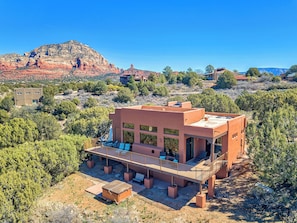 Private hot tub and wrap around balcony for stargazing and relaxing after a day of exploring.