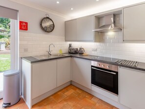 Kitchen, Kitchen Appliance, Countertop, Major Appliance, Cabinetry, Interior Design, Flooring, Home Appliance, Kitchen Stove, Wood