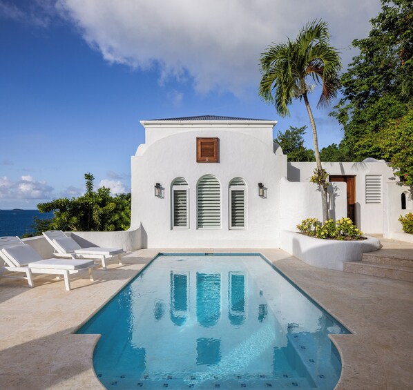 Mediterranean style pool deck with bedroom 1 behind