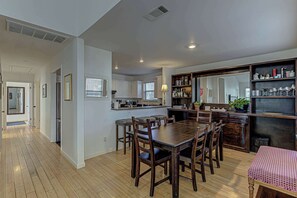 Dining table with seating for 6 and additional counter seating 