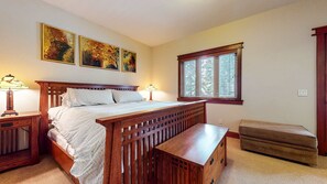 Bedroom 4 with king bed, deck, and ensuite
