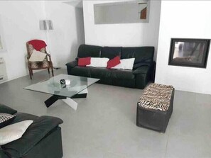 living room, sofa, table, chairs