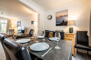 The dining table is extendable and seats up to 8 people