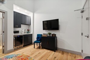Wet Bar: mini fridge, coffee maker, microwave and other basics