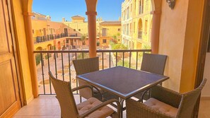 Private balcony with outdoor seating, perfect for enjoying your morning coffee.