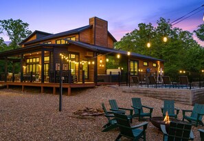 Gather around the fire pit under a canopy of stars, surrounded by lush greenery and Adirondack chairs that invite late-night conversations and marshmallow roasting.
