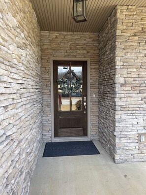 Front entry door with a key pad. The doorway is wheelchair accessible. No steps!
