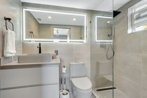 Experience peace of mind in this immaculately clean and sanitized bathroom.