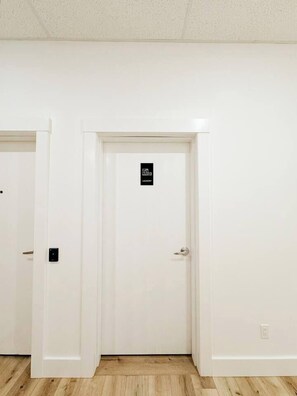 Laundry room in public corridor.