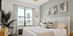 Relax in the comfort of a  king bed with a private bath, offering a perfect retreat for ultimate relaxation.