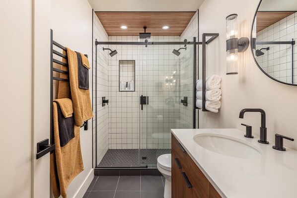 Bathroom has in-floor heat as well as a heated towel rack and much more