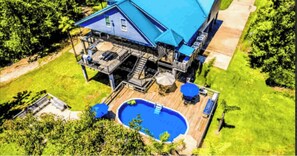 Aerial view of Great Escape Pool, firepit, & rear of house