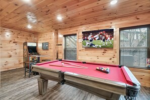 Enjoy a room full of fun activities! Pool table, arcade, table games, and TV.