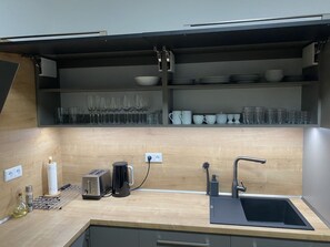 Countertop, Cabinetry, Kitchen Sink, Kitchen, Tap, Sink, Interior Design, Plumbing Fixture, Wood, Kitchen Stove