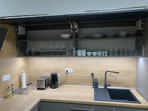 Countertop, Cabinetry, Kitchen Sink, Kitchen, Tap, Sink, Interior Design, Plumbing Fixture, Wood, Kitchen Stove