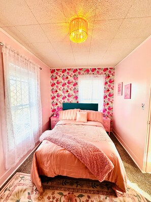 Bed with Luxury Linens and special touches.