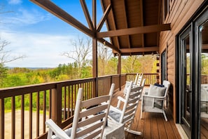 Lined with rocking chairs and surrounded by the Smoky Mountains, the upper deck is made for unwinding with a good book and a better view.