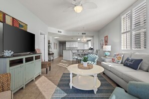 Living Area - The open living area features plenty of comfortable seating and a large television for enjoying in your down time.