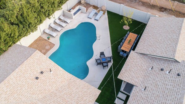 "Gather, relax, and create unforgettable memories in our spacious backyard! 🌟🌿"