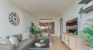 The apartment benefits from an open planned living space