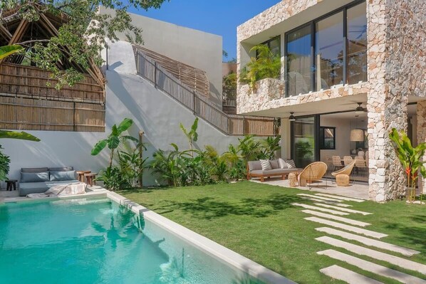 Incredible backyard of the property with a fantastic pool and outdoor dining area