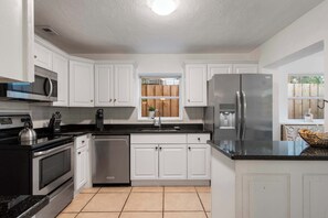 Cook, create, and enjoy in this modern kitchen. 