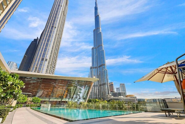 Skyline Oasis: Dive into luxury with stunning views of the Burj Khalifa and a shimmering pool!