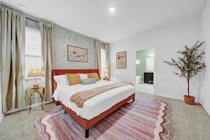 Plush beddings for master's bedroom with en suite bathroom