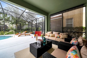 Patio with a pool view