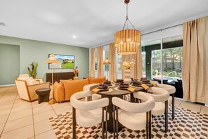 Guests can watch TV from the dining area