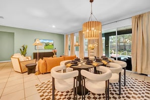Guests can watch TV from the dining area