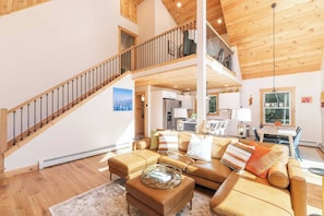 Main living area looking up to loft office