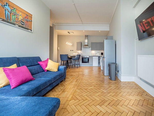 Comfortable seating area with a double sofa bed, perfect for relaxation.