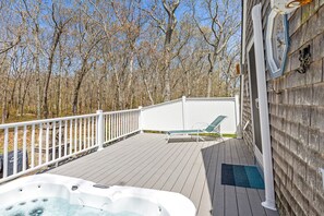 Hot tub overlooking the backyard.