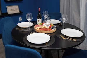 Set the table with our provided utensils, including cutlery, plates, glasses, and napkins, ensuring a seamless and convenient dining experience.