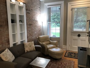 Living area with exterior entrance door