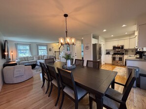 Open dining, living, and kitchen space for gathering