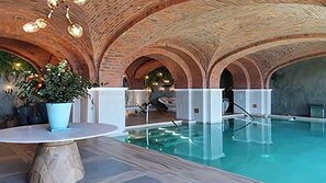 Luxury indoor spa pool with vaulted brick ceilings at Vista Encantada.